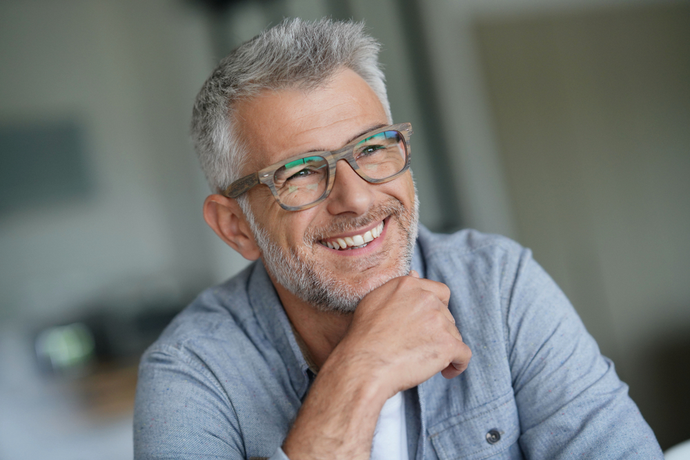 Middle aged man wearing eye glasses - Diabetic Eye Exams Huntington Beach