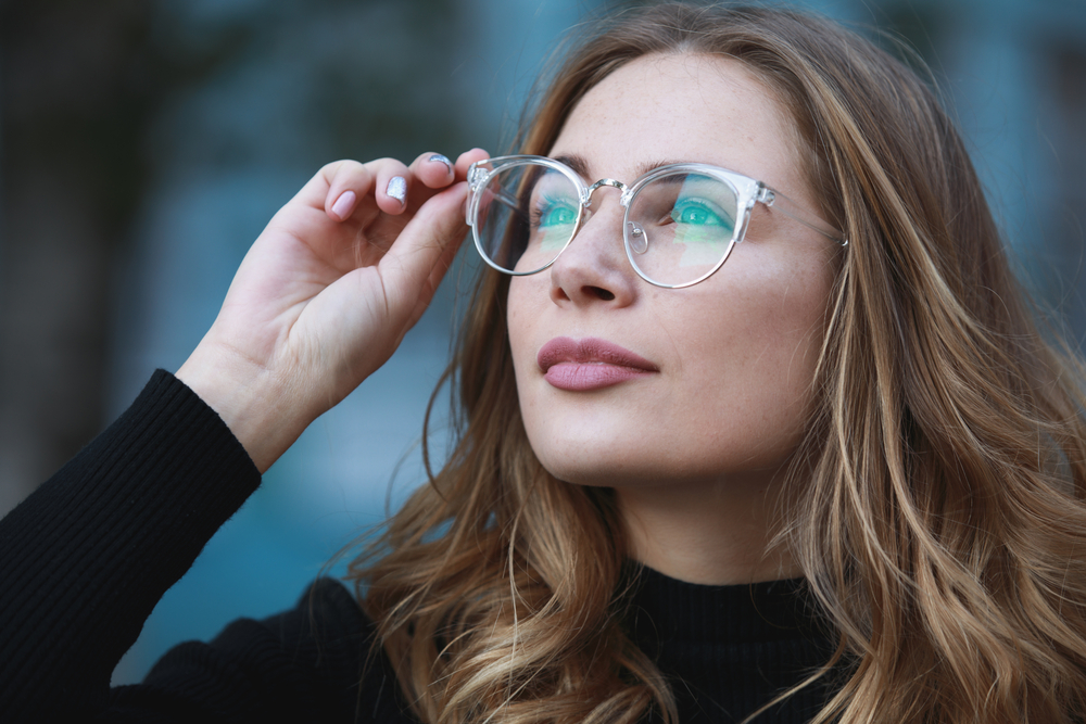 Myopia close up portrait of young woman student in eyeglasses - Myopia Control Huntington Beach